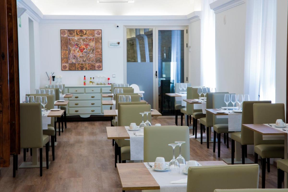 Un restaurante o sitio para comer en Hotel Balneario El Raposo