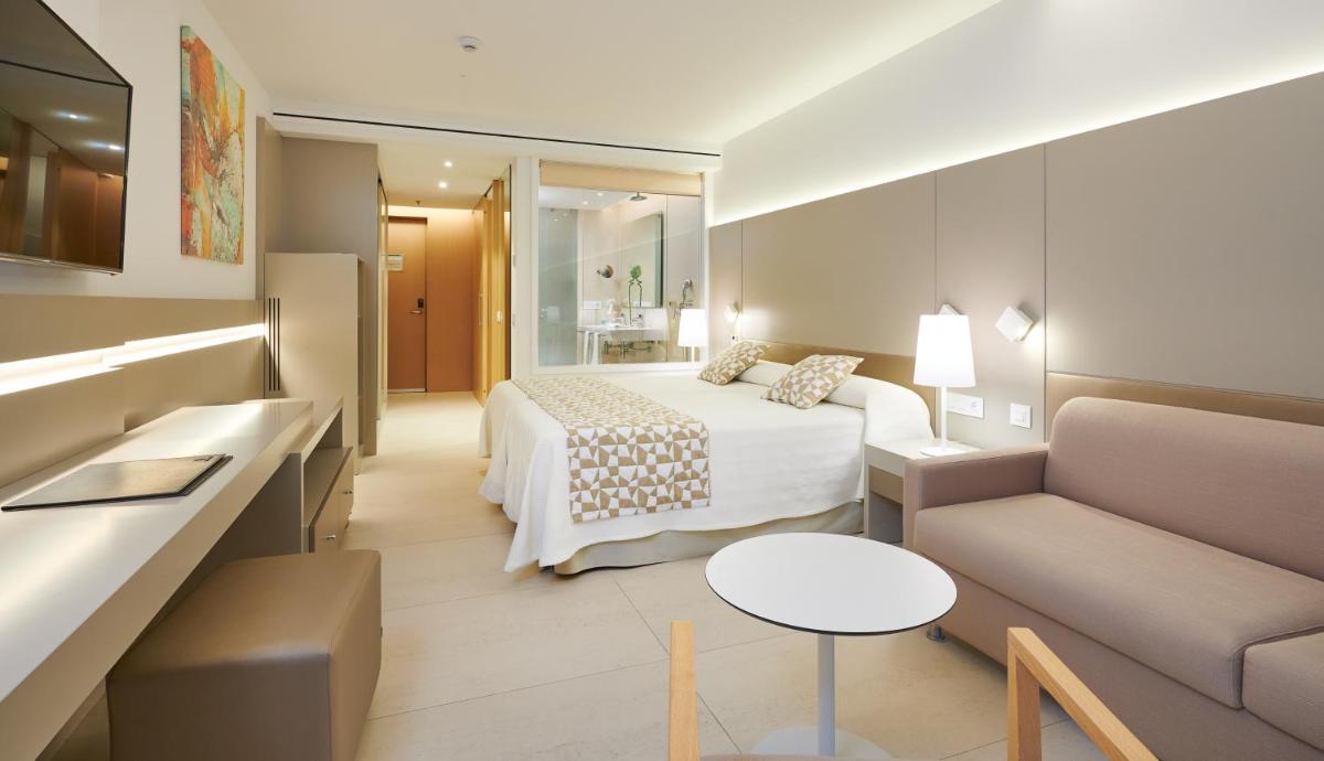 Cama o camas de una habitación en Hipotels Gran Playa de Palma