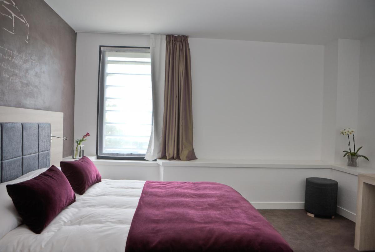 Un ou plusieurs lits dans un hébergement de l'établissement Best Western Plus Villa Saint Antoine Hotel & Spa