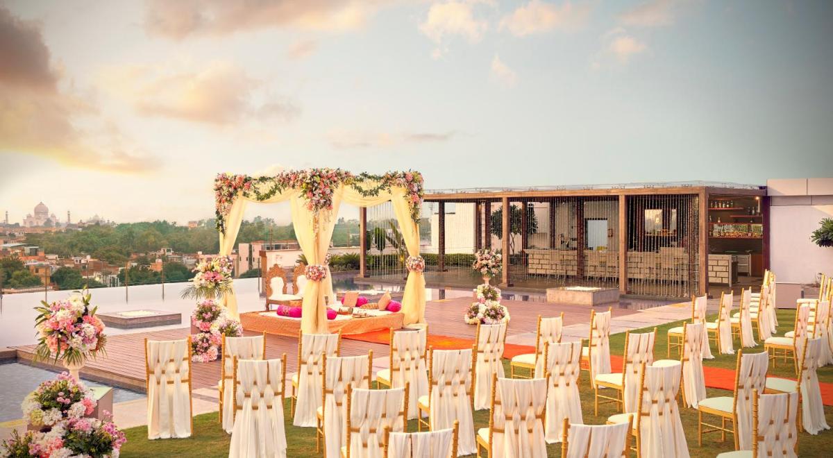 a wedding ceremony on the roof of a building at Taj Agra in Agra