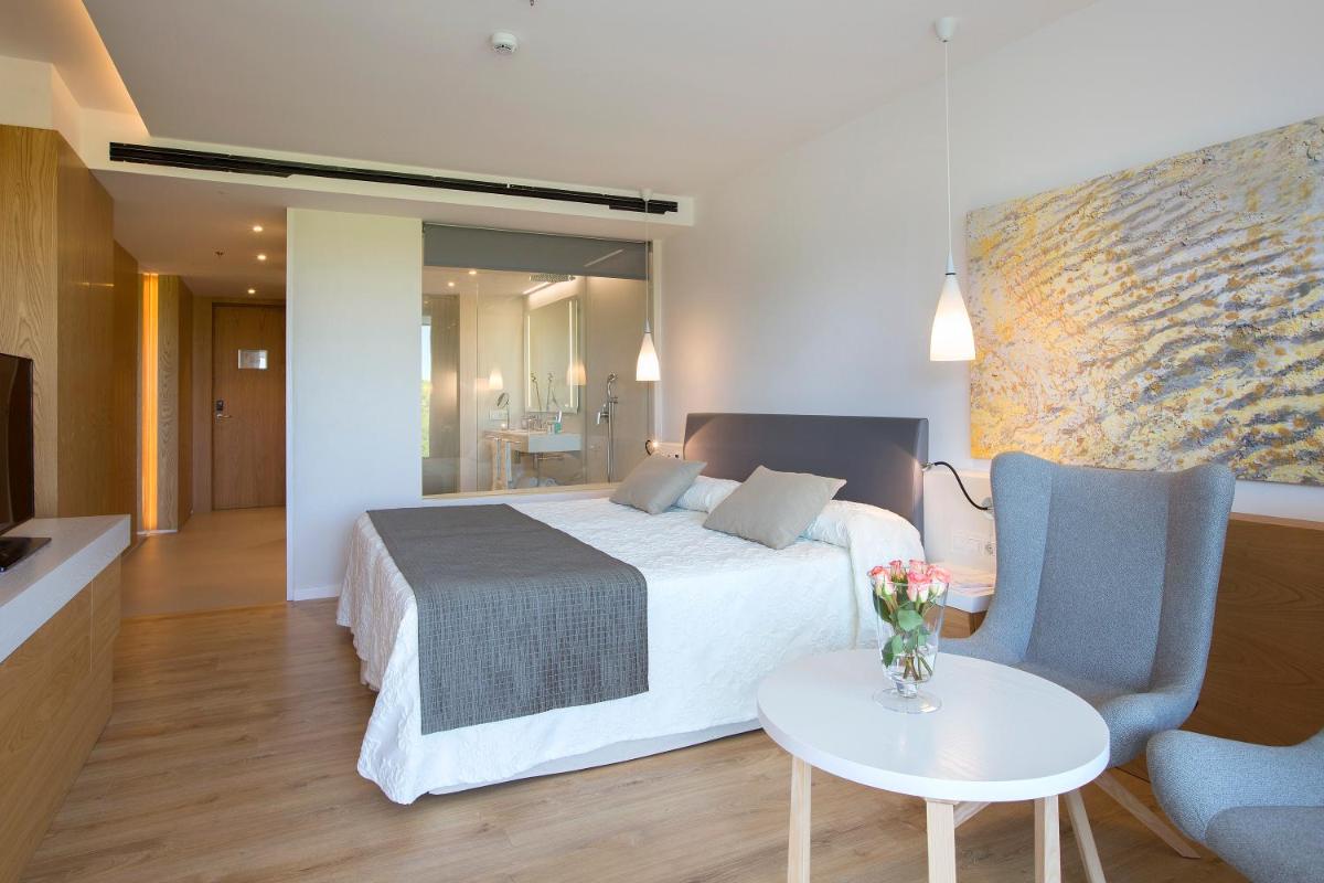 Cama o camas de una habitación en Hipotels Playa de Palma Palace&Spa