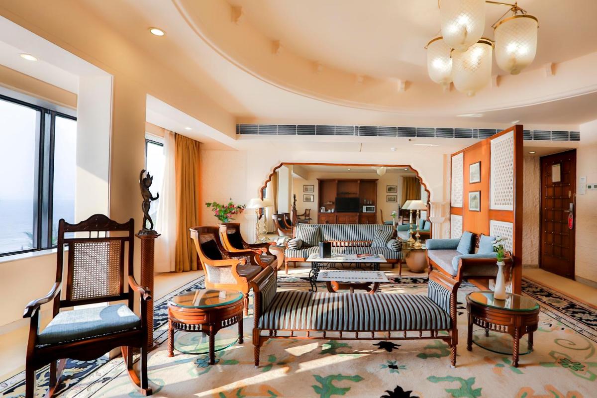 a living room with chairs and a couch at Sun-n-Sand Mumbai Juhu Beach in Mumbai