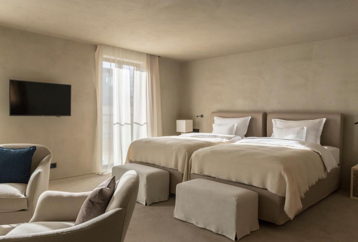 Ein Bett oder Betten in einem Zimmer der Unterkunft Hotel Bayerischer Hof