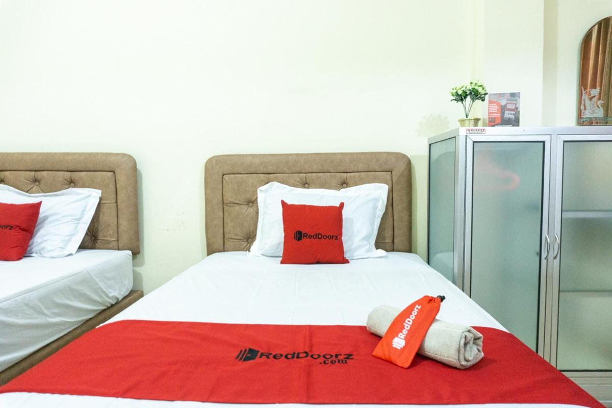 RedDoorz @ Gatot Subroto Ende - Housity