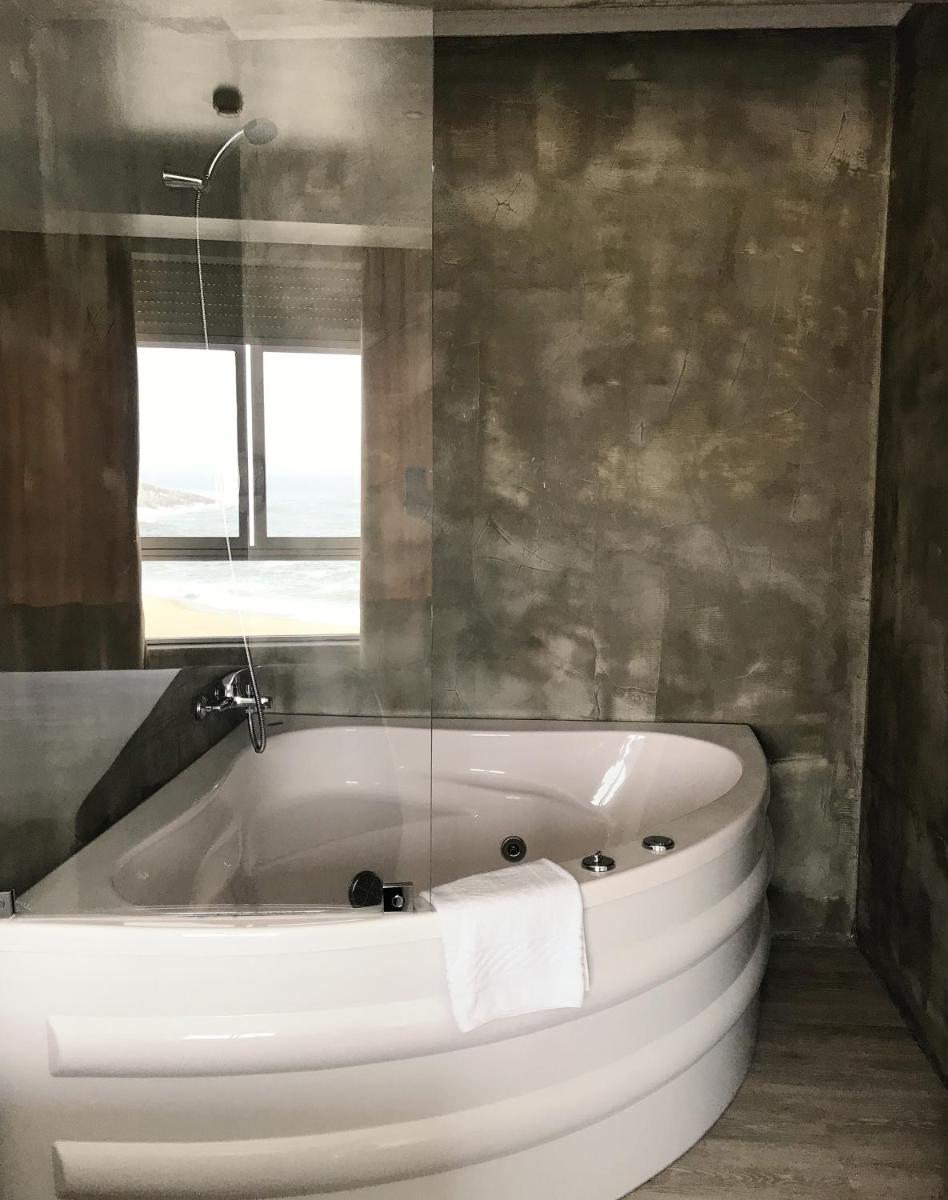 Uma casa de banho em Promar - Eco Beach & Spa Hotel
