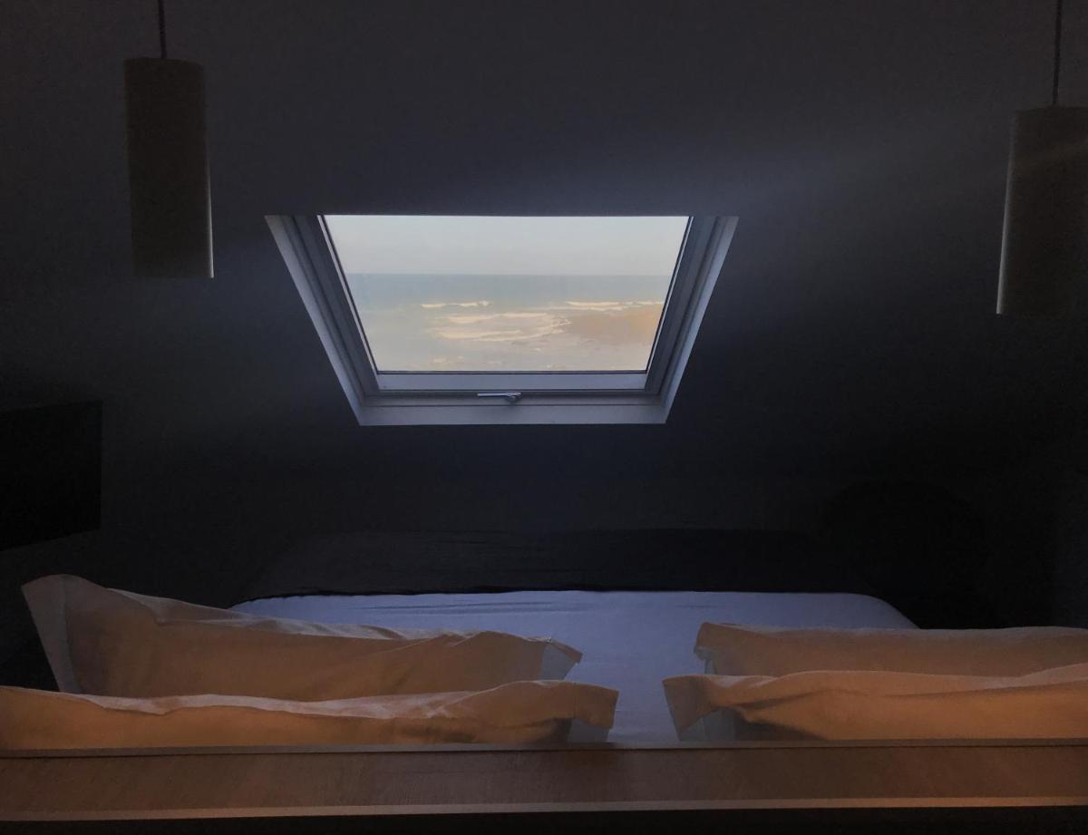 Uma cama ou camas num quarto em Promar - Eco Beach & Spa Hotel