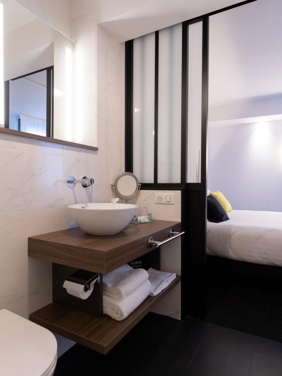 Un ou plusieurs lits dans un hébergement de l'établissement Best Western Plus Europe Hôtel Brest