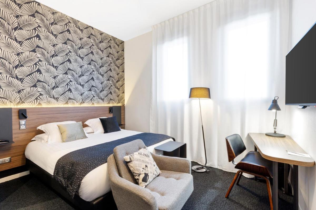 Un ou plusieurs lits dans un hébergement de l'établissement Best Western Plus Europe Hôtel Brest