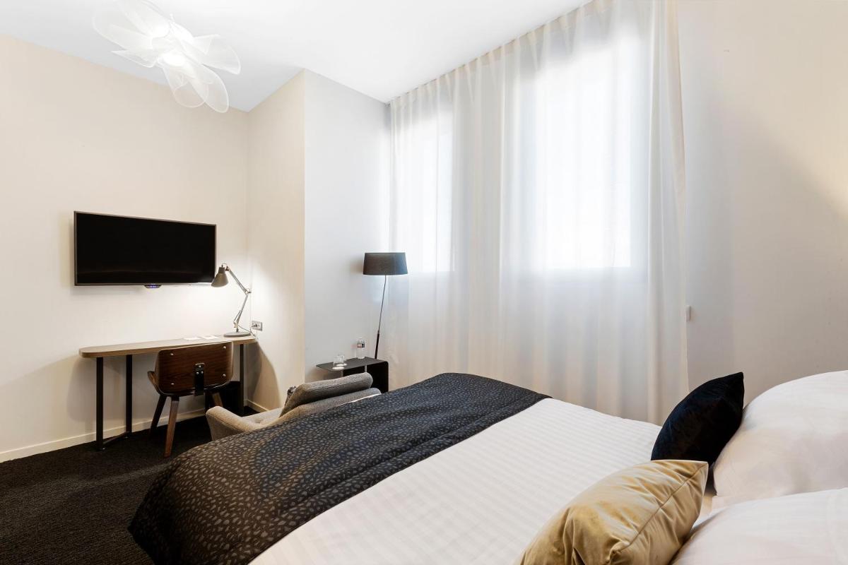 Un ou plusieurs lits dans un hébergement de l'établissement Best Western Plus Europe Hôtel Brest