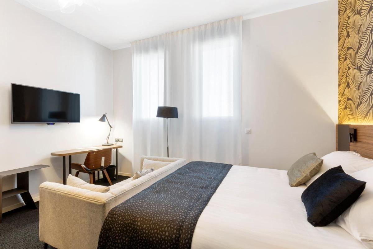 Un ou plusieurs lits dans un hébergement de l'établissement Best Western Plus Europe Hôtel Brest