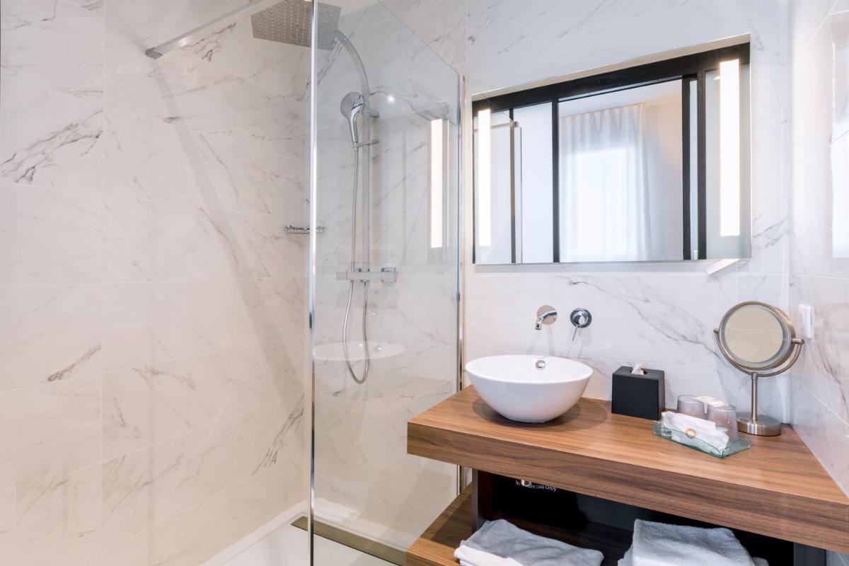 Salle de bains dans l'établissement Best Western Plus Europe Hôtel Brest