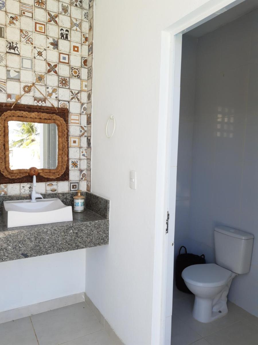 Casa de praia condomínio fechado, frente para o mar - Housity