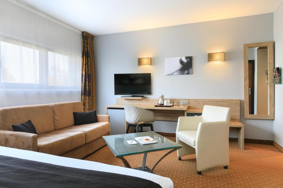 Télévision ou salle de divertissement dans l'établissement 7Hotel&Spa