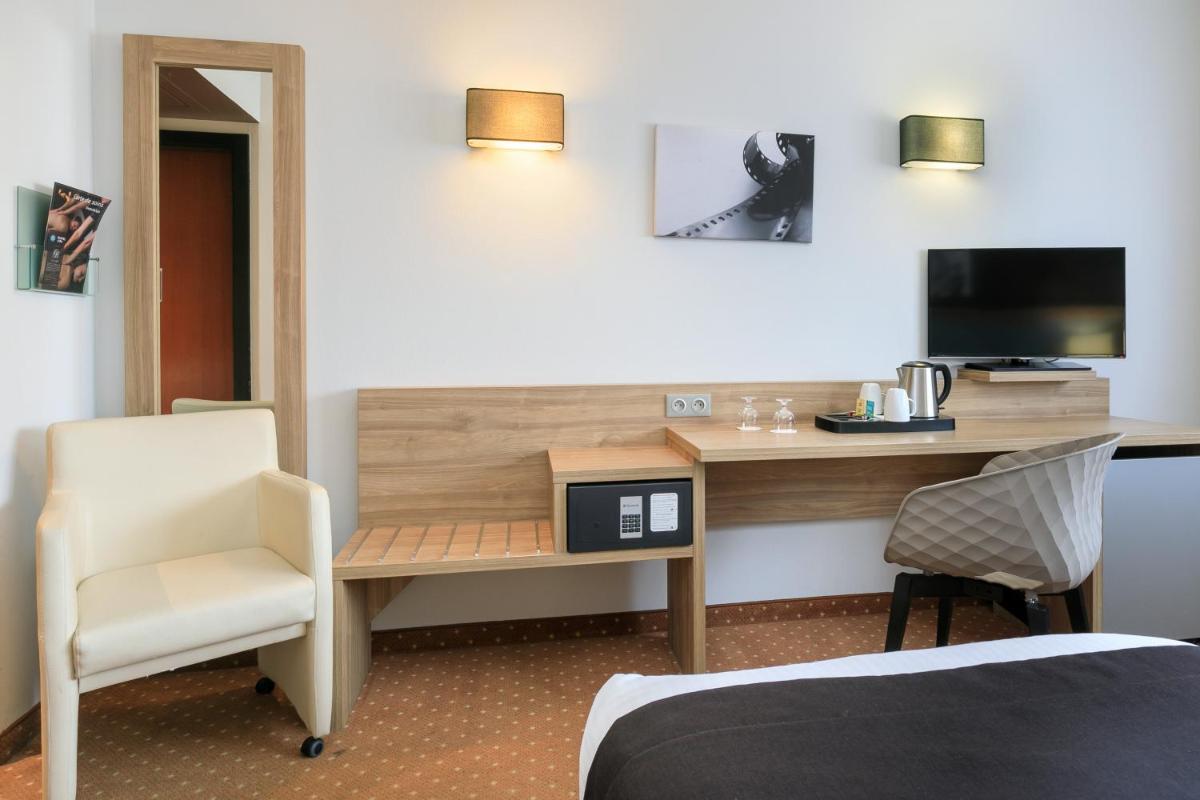Télévision ou salle de divertissement dans l'établissement 7Hotel&Spa