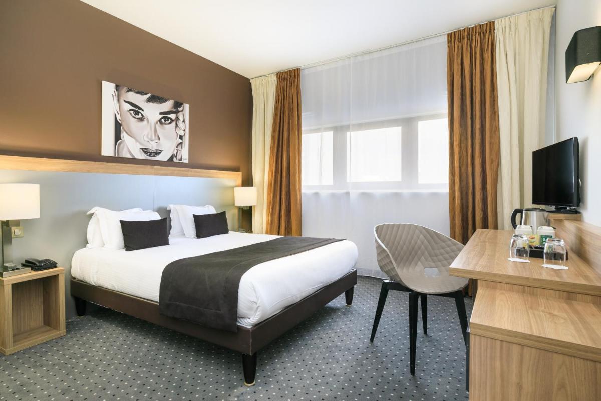 Un ou plusieurs lits dans un hébergement de l'établissement 7Hotel&Spa