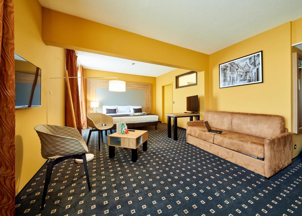 Coin salon dans l'établissement 7Hotel&Spa