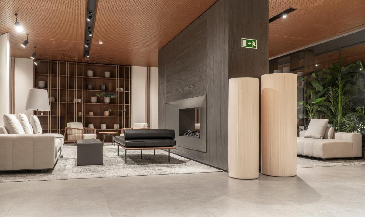 Uma área de estar em Hotel Verde Mar & SPA