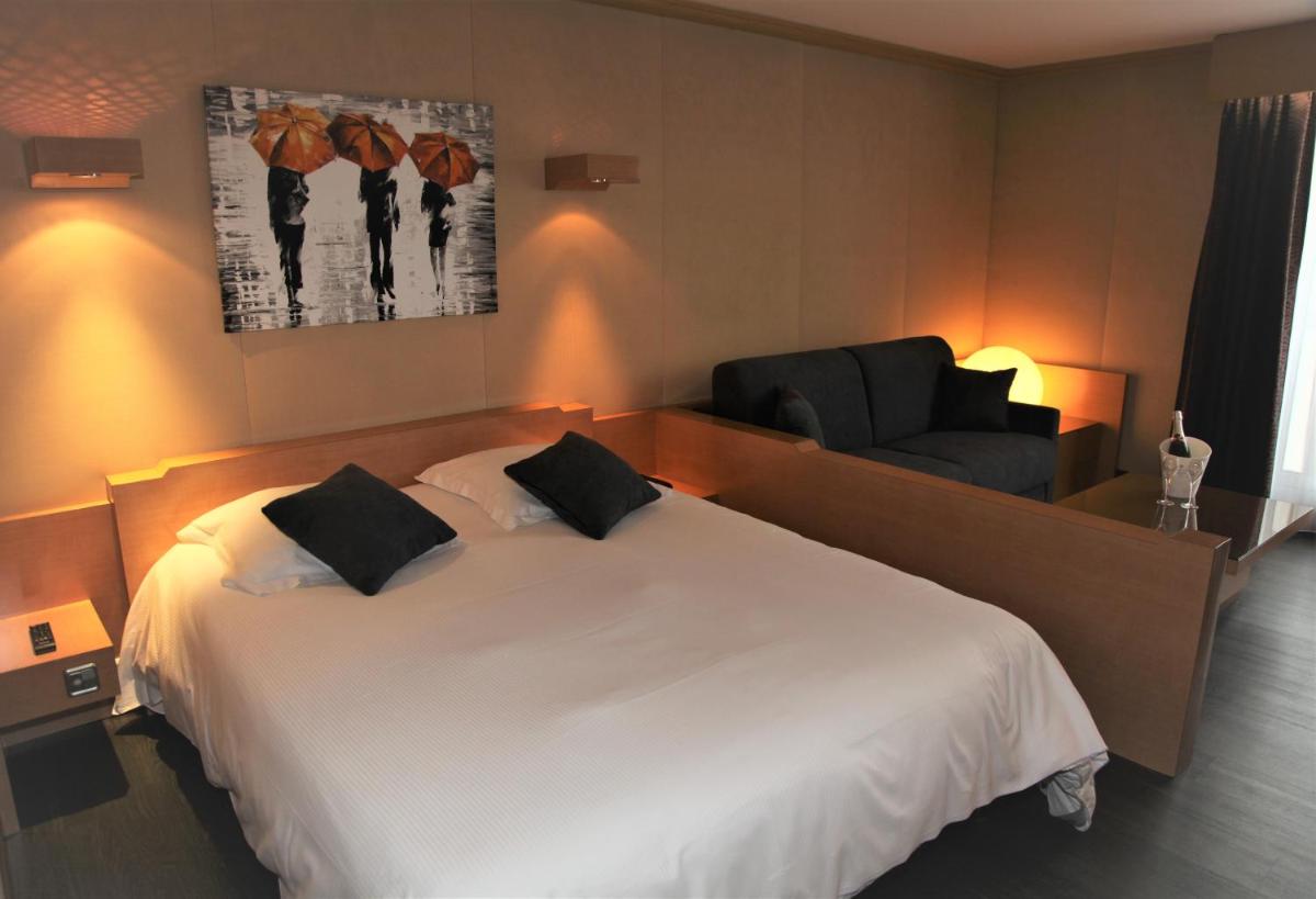Un ou plusieurs lits dans un hébergement de l'établissement Amirauté Hôtel Golf Deauville