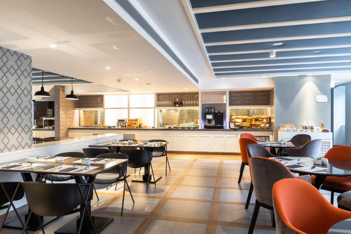 A cozinha ou kitchenette de Catalonia Porto