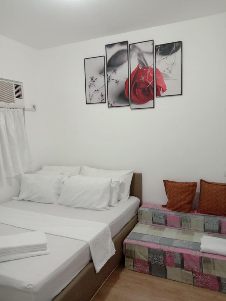 2BR townhouses good for 12pax each & NETFLIX & 100Mbps WIFI & pool resort 2min walk & 3km outside Pico de Loro Cove & Calayo Cove - with Endorsement for Pico de Loro Cove good for 7 days & Boat-Tour & Island Hopping assistance - Housity