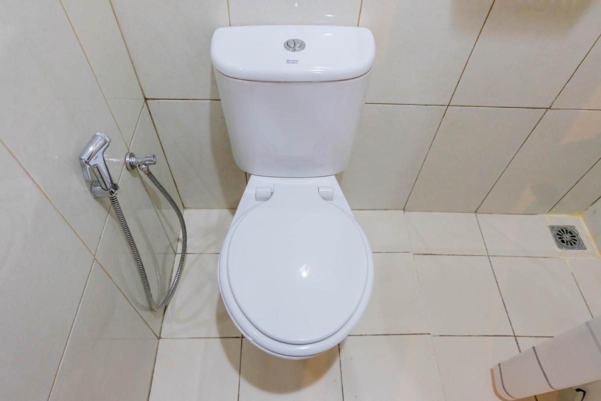 Warm and Relax 1BR at Asatti Garden House Apartment By Travelio - Housity
