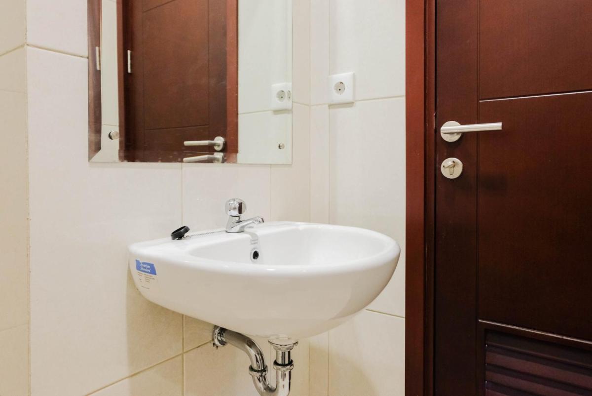 Homey and Simple 1BR at Asatti Apartment By Travelio - Housity