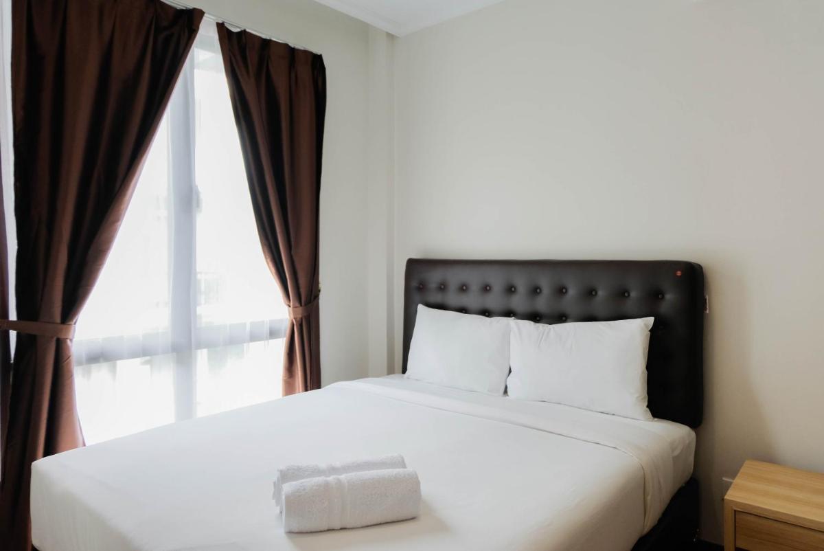 Homey and Simple 1BR at Asatti Apartment By Travelio - Housity
