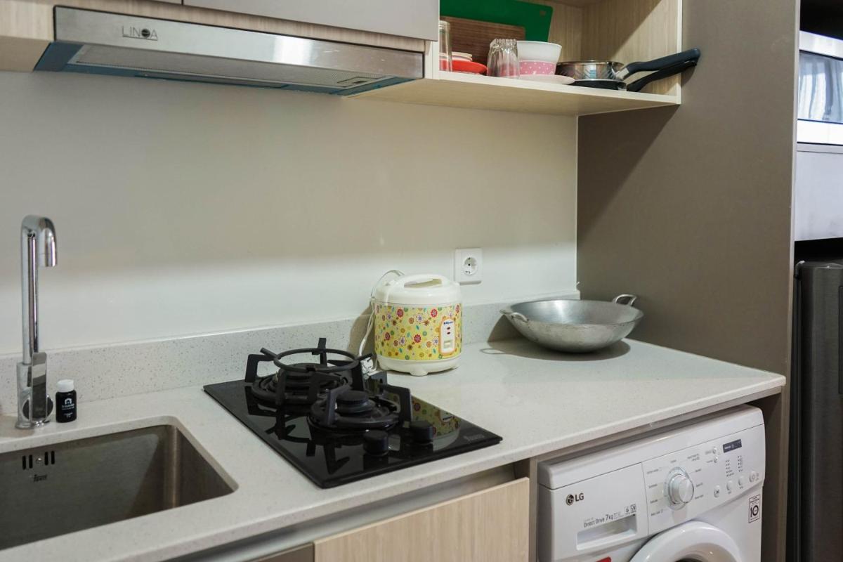 New Furnished Studio with Sea View at Gold Coast Apartment By Travelio - Housity