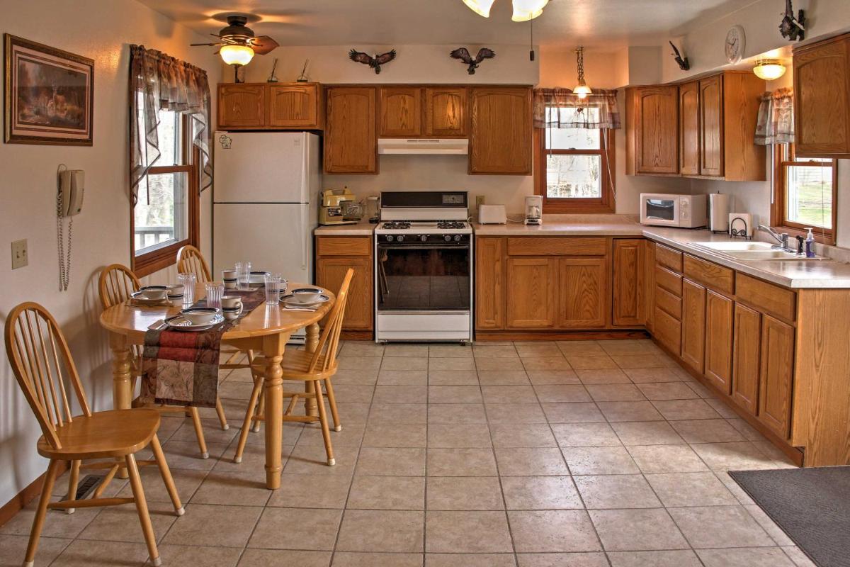 Cozy Balsam Lake Home Deck, Private Dock and Kayaks - Housity