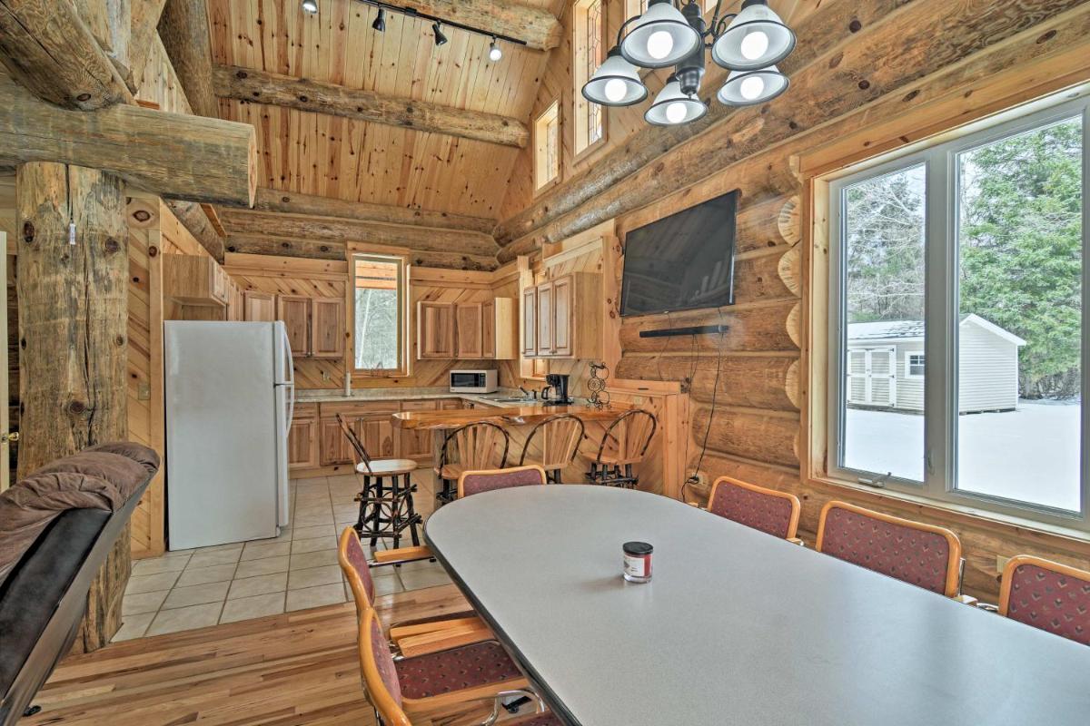 Custom Log Cabin with Deck and 45 Acres by Pine River! - Housity