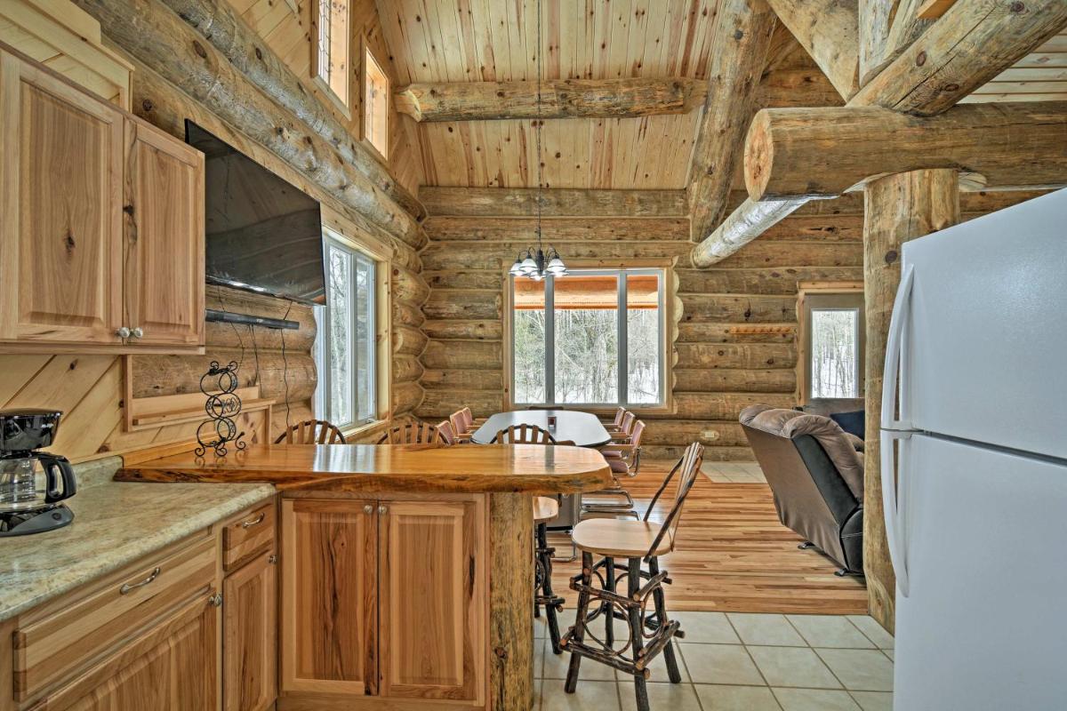 Custom Log Cabin with Deck and 45 Acres by Pine River! - Housity