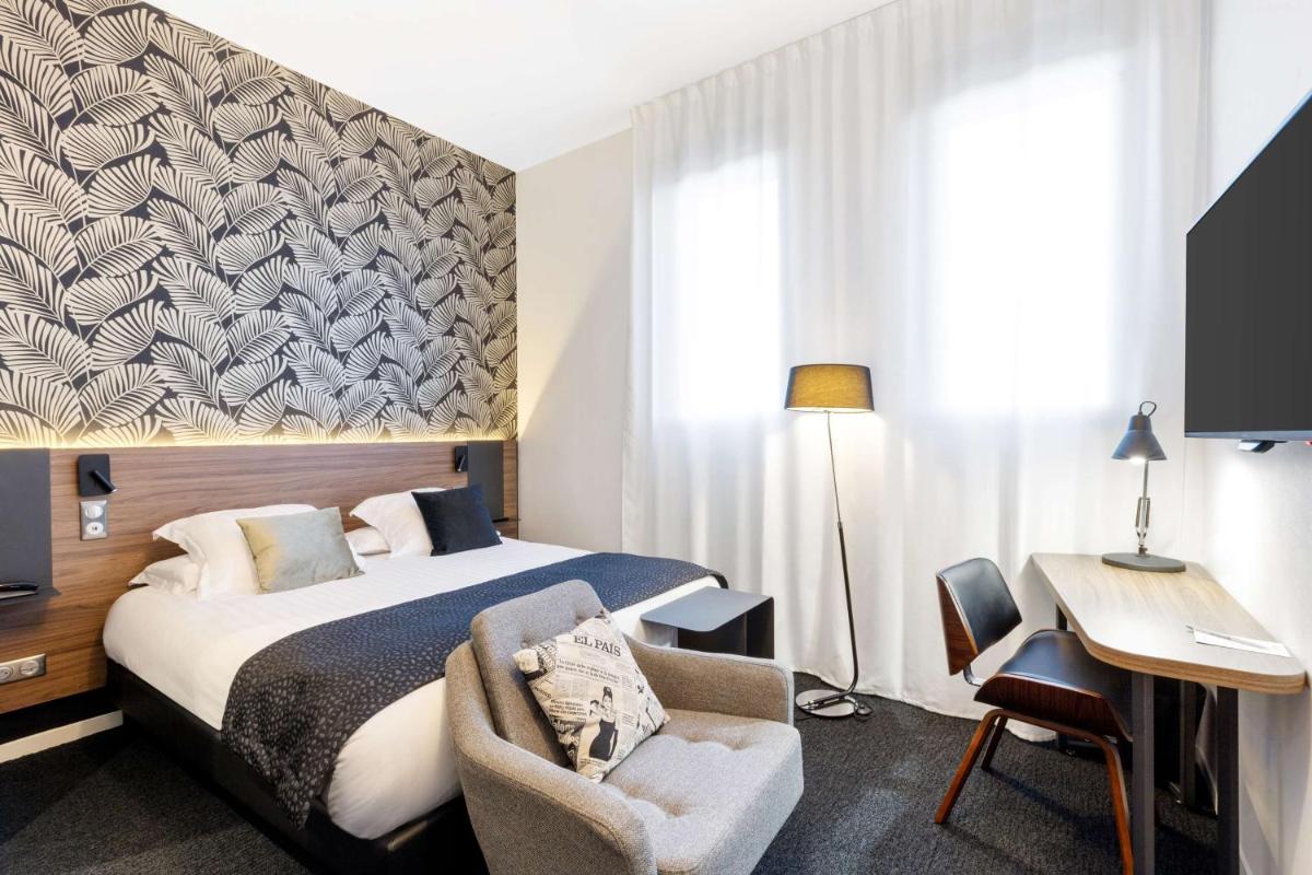 Un ou plusieurs lits dans un hébergement de l'établissement Best Western Plus Europe Hôtel Brest