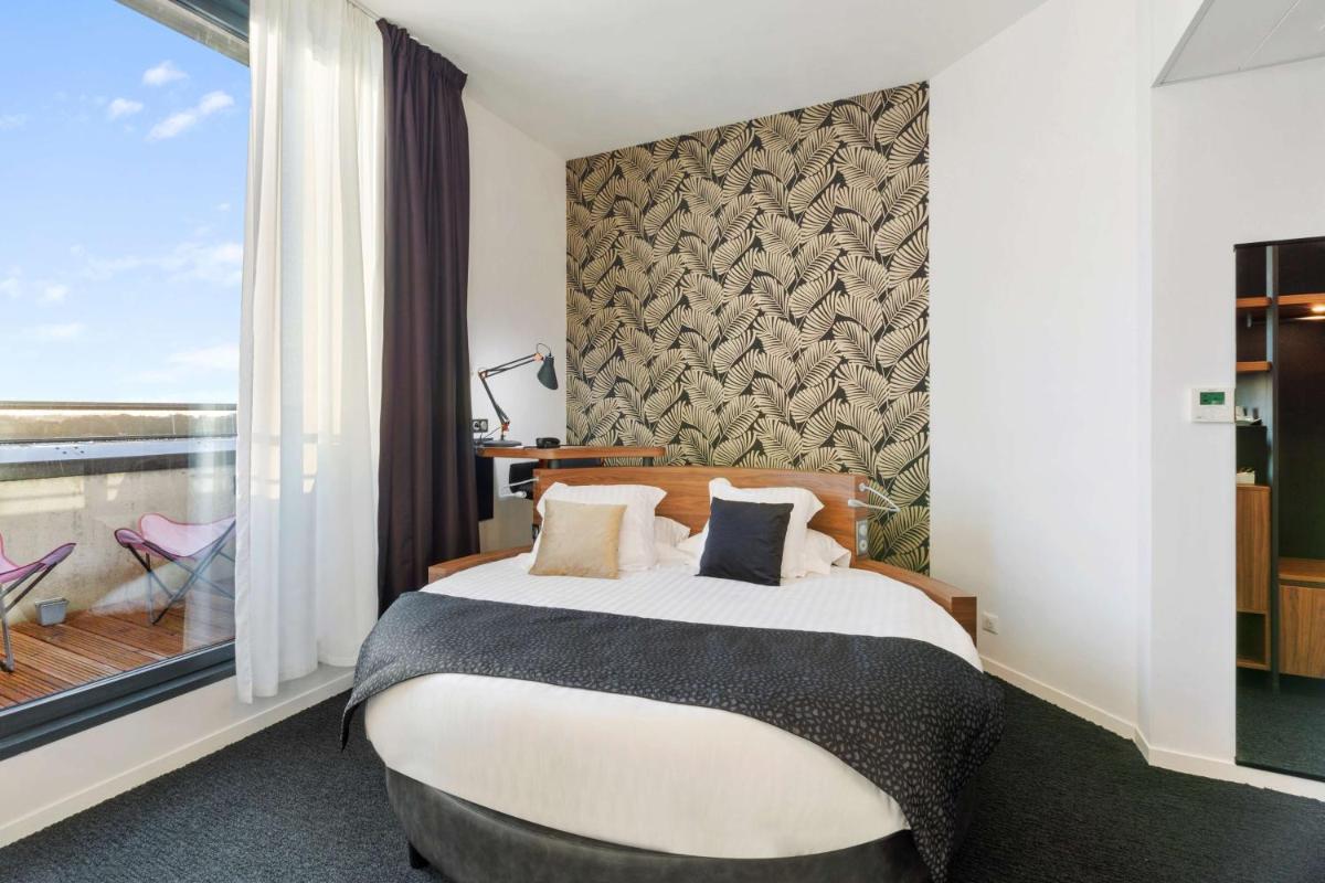 Un ou plusieurs lits dans un hébergement de l'établissement Best Western Plus Europe Hôtel Brest