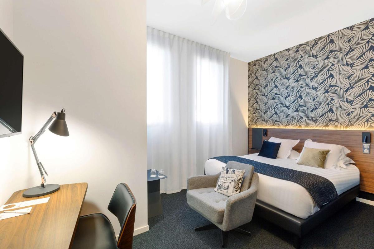 Un ou plusieurs lits dans un hébergement de l'établissement Best Western Plus Europe Hôtel Brest