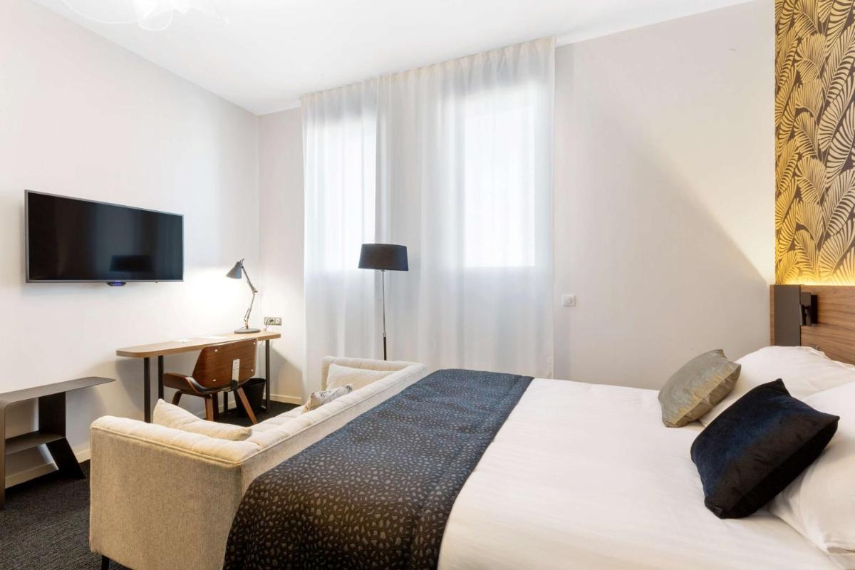 Un ou plusieurs lits dans un hébergement de l'établissement Best Western Plus Europe Hôtel Brest