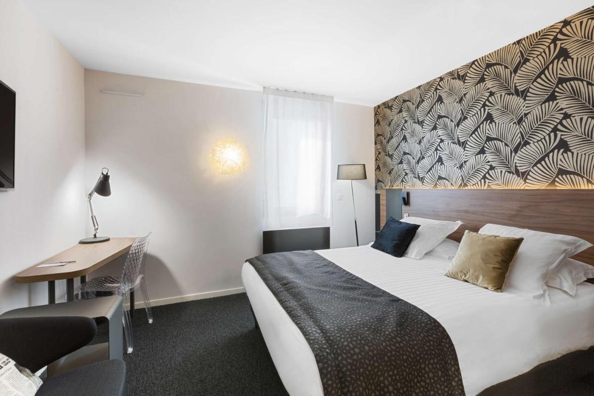Un ou plusieurs lits dans un hébergement de l'établissement Best Western Plus Europe Hôtel Brest