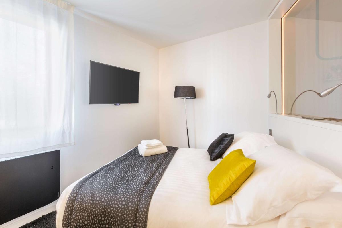Un ou plusieurs lits dans un hébergement de l'établissement Best Western Plus Europe Hôtel Brest