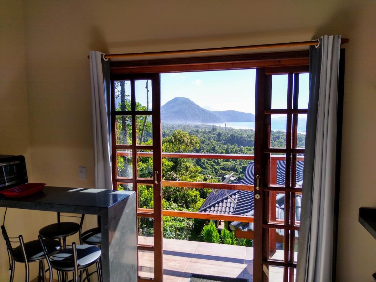 Burung Flats Itamambuca - Hospedagem com vista para o mar - Housity