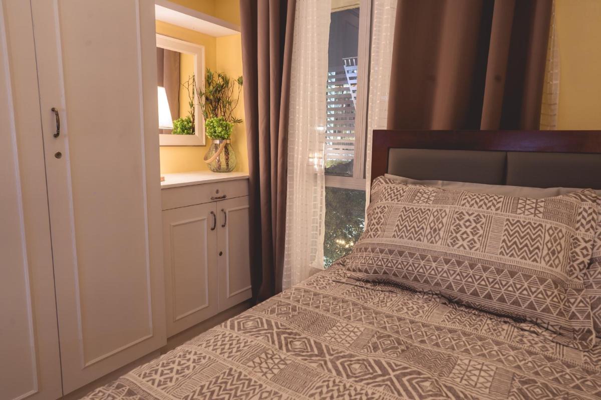 Avida Towers Cebu 518, Queen bed, Netflix 50in Smart TV - Housity