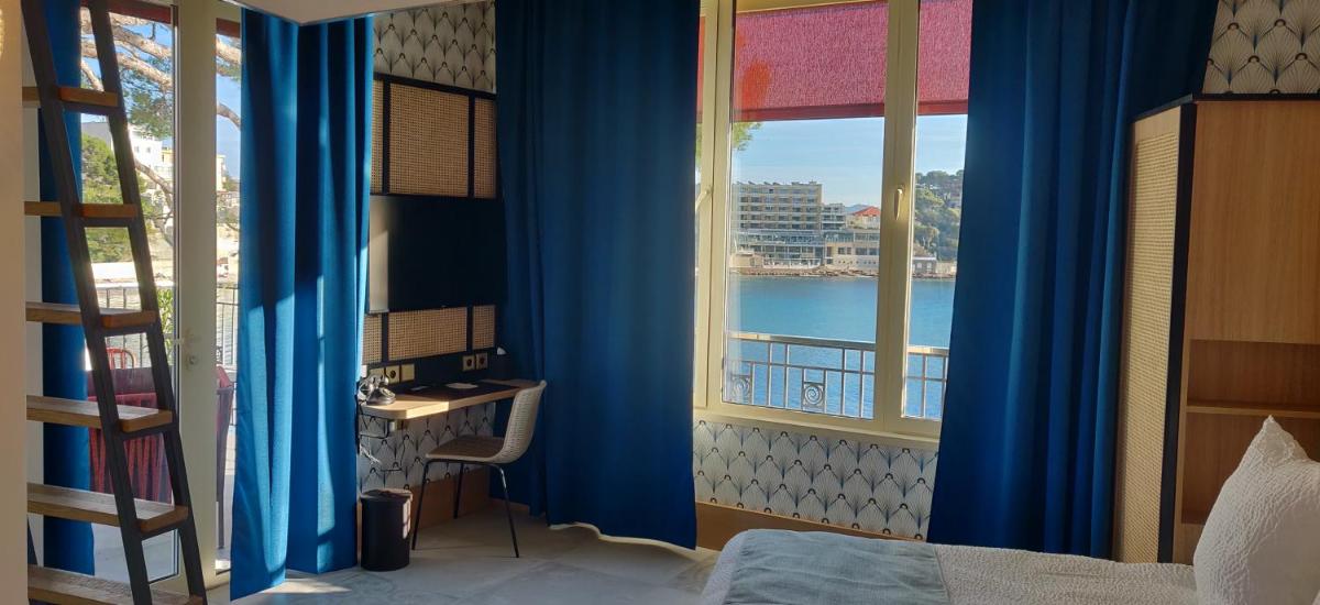 Un ou plusieurs lits dans un hébergement de l'établissement Splendid Hôtel & Spa