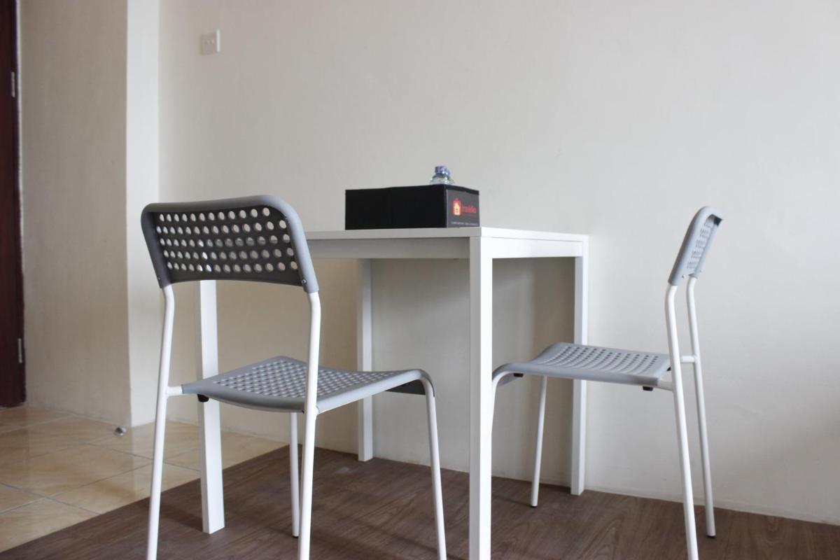 Premium 2BR Tamansari Panoramic Apartment By Travelio - Housity