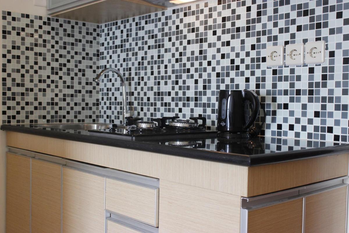 Premium 2BR Tamansari Panoramic Apartment By Travelio - Housity