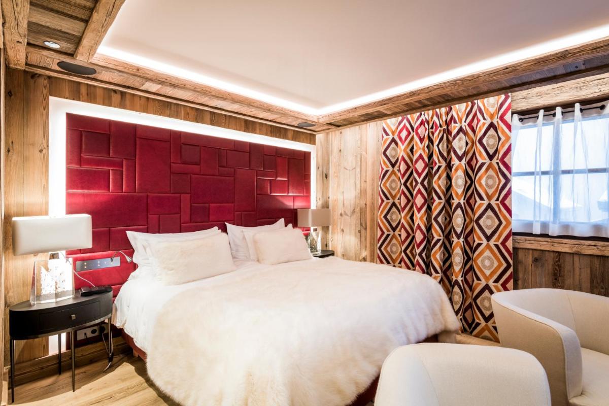 Un ou plusieurs lits dans un hébergement de l'établissement Armancette - The Leading Hotels of the World