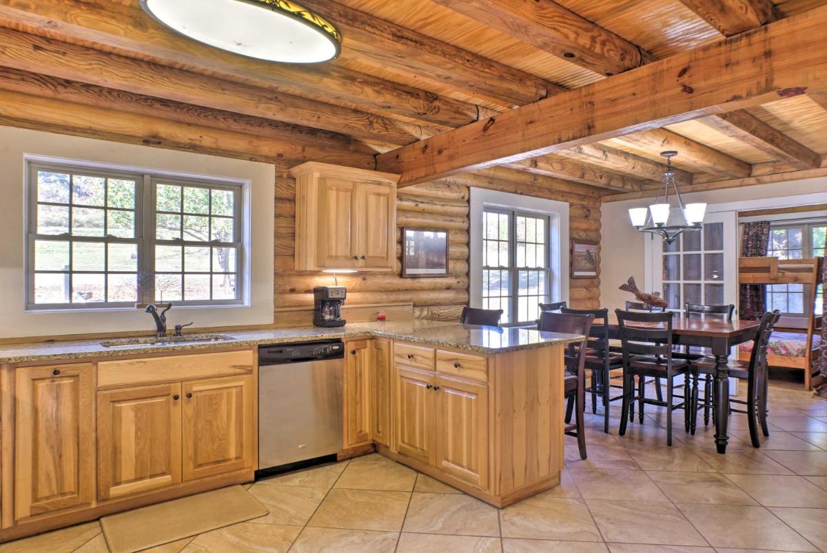 Scottsboro Cabin with Fire Pit and Stocked Pond Access - Housity