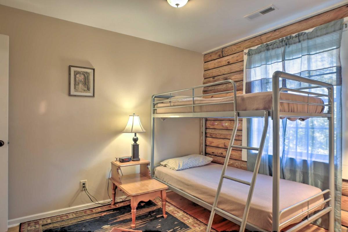 Scottsboro Cabin with Fire Pit and Stocked Pond Access - Housity