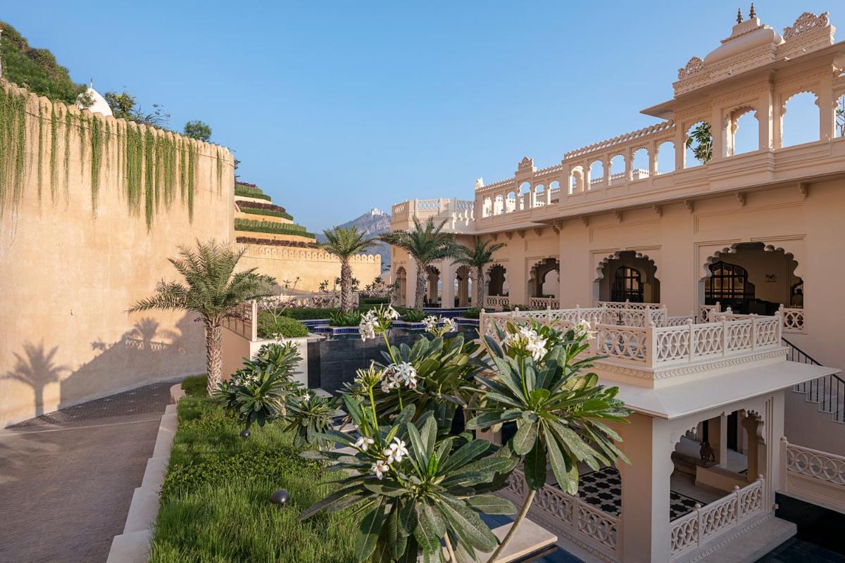 an exterior view of a building with a balcony at Aurika, Udaipur - Luxury by Lemon Tree Hotels in Udaipur