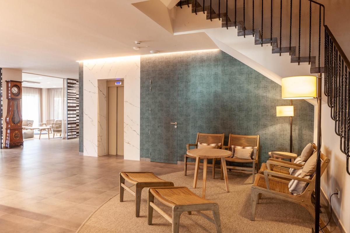 Zona de estar de Hotel Montecarlo Spa & Wellness