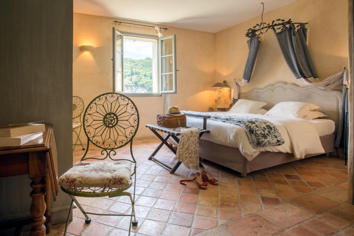 Coin salon dans l'établissement Hôtel-Spa Le Saint Cirq