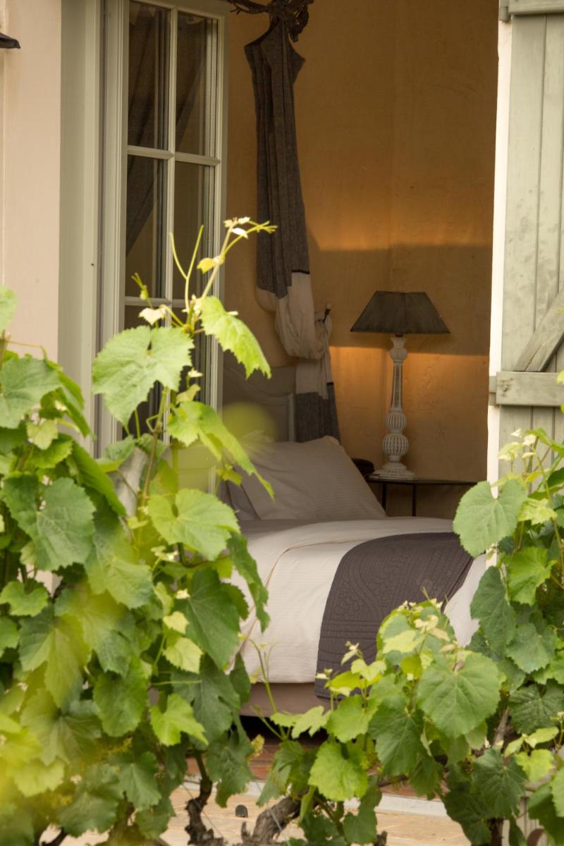 Coin salon dans l'établissement Hôtel-Spa Le Saint Cirq