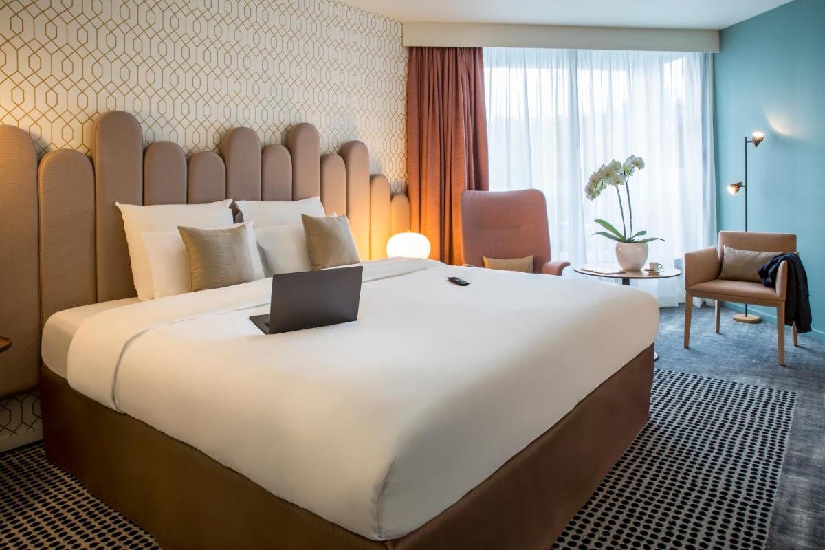 Un ou plusieurs lits dans un hébergement de l'établissement Mercure Aix-les-Bains Domaine de Marlioz Hôtel & Spa